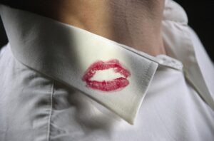 lipstick mark on white collared shirt