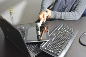 hammer smashing a tablet 